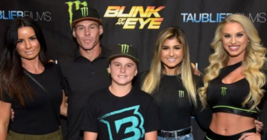 Mark Hoppus and Elaina pose with their children at a blink-182 concert in Las Vegas, capturing a joyful family moment.